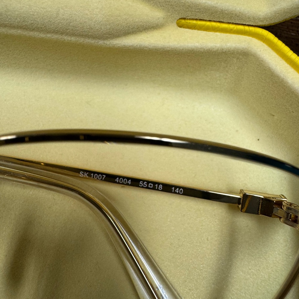 Swarovski Gold Round Glasses with Minimalist Design - Picture 2 of 3